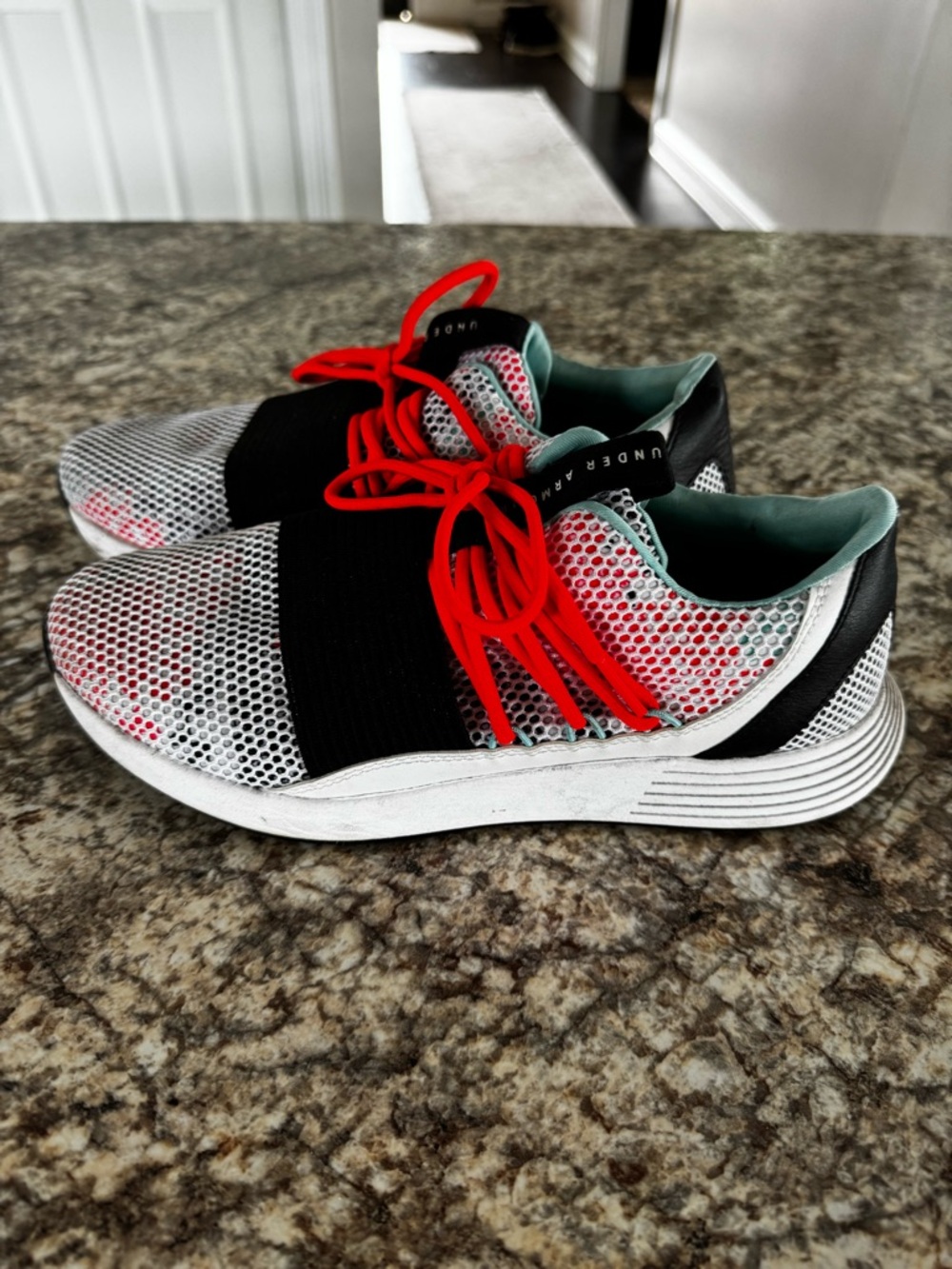 Under Armour White and Black Mesh Slip-On Sneakers with Vibrant Laces